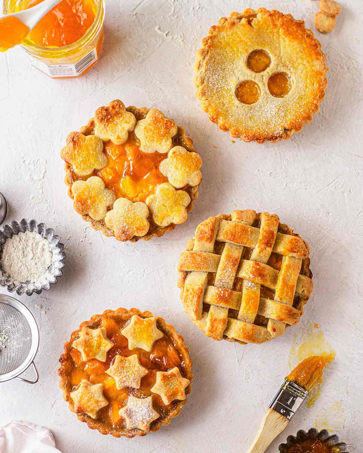 Flatlay of mango peach pies.