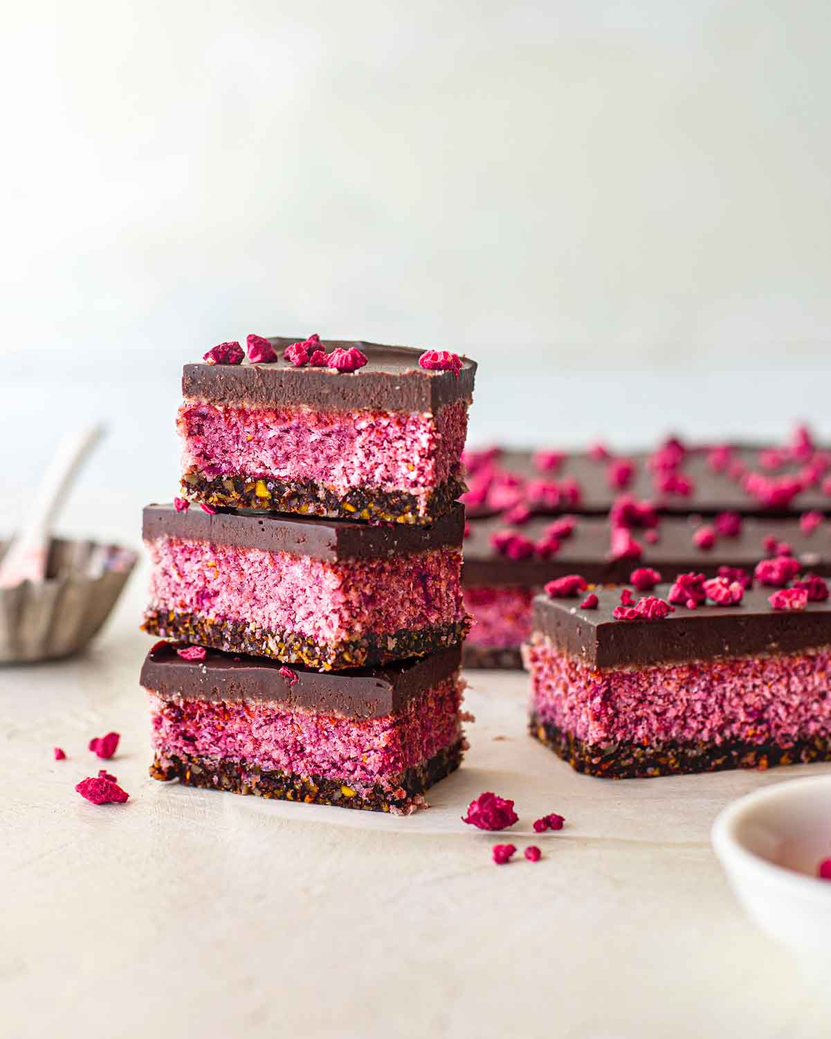 Stack of vegan raspberry slices.