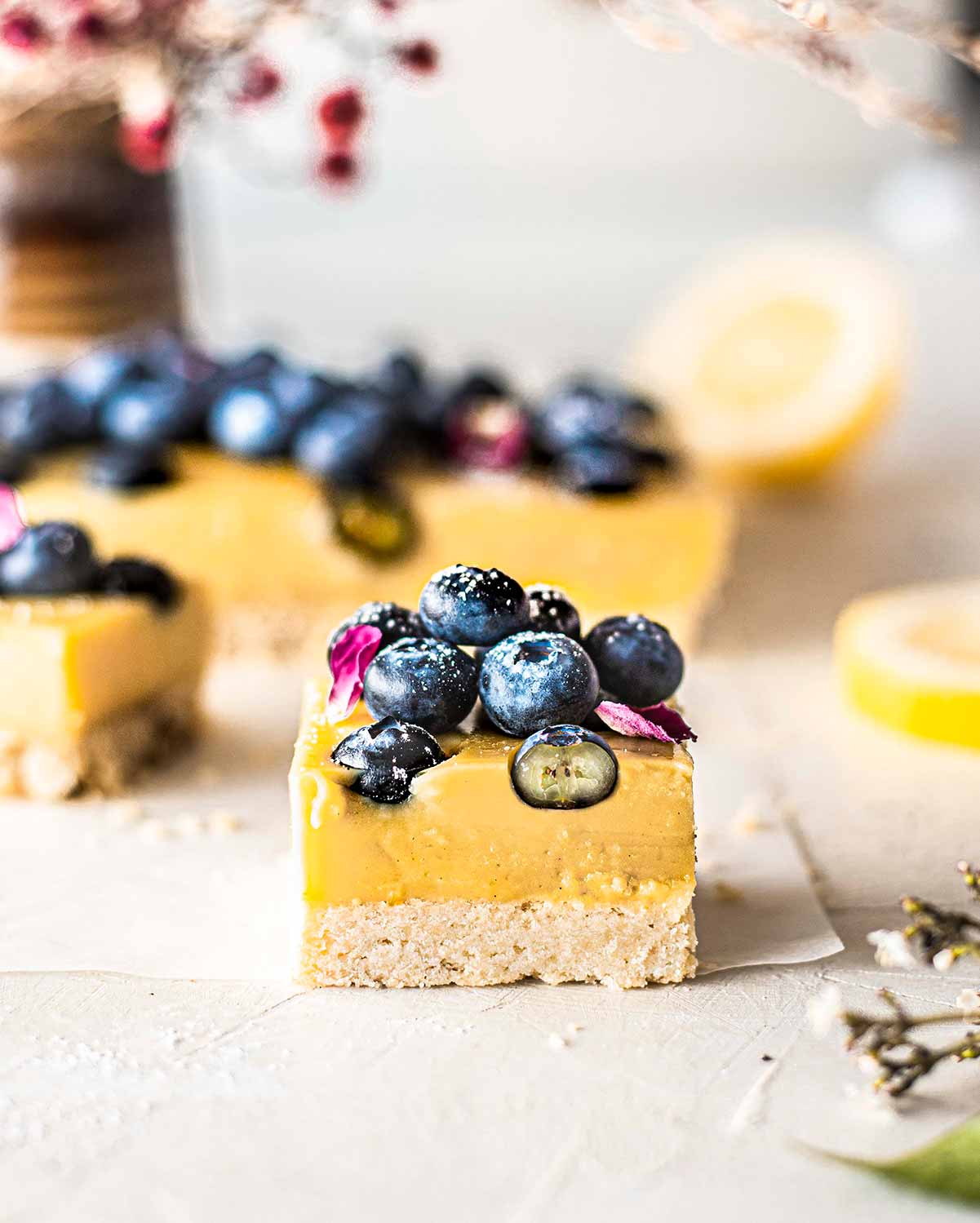 Close up of vegan berry lemon bar.