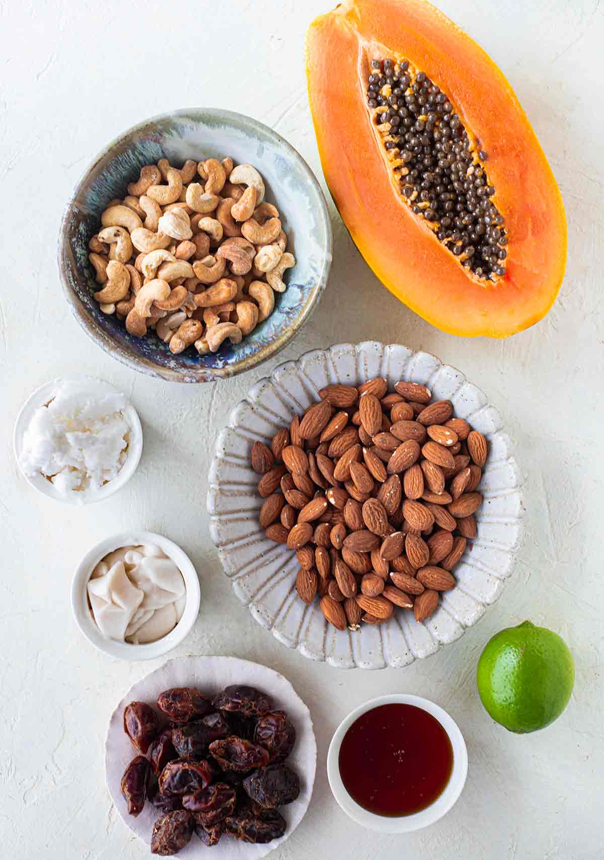 Flatlay of ingredient for vegan papaya lime bars.