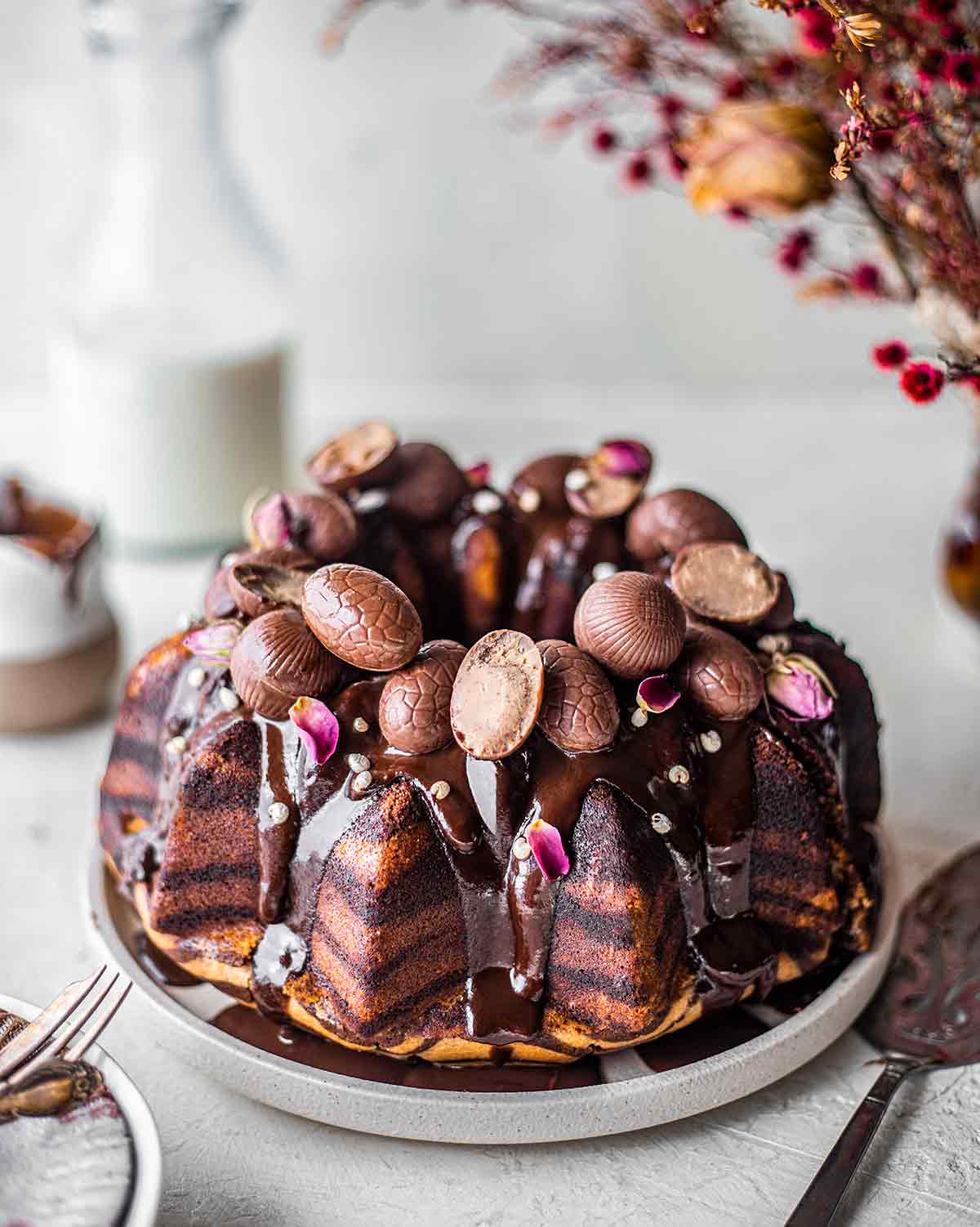 Vegan Zebra Bundt cake with Easter Eggs on top.