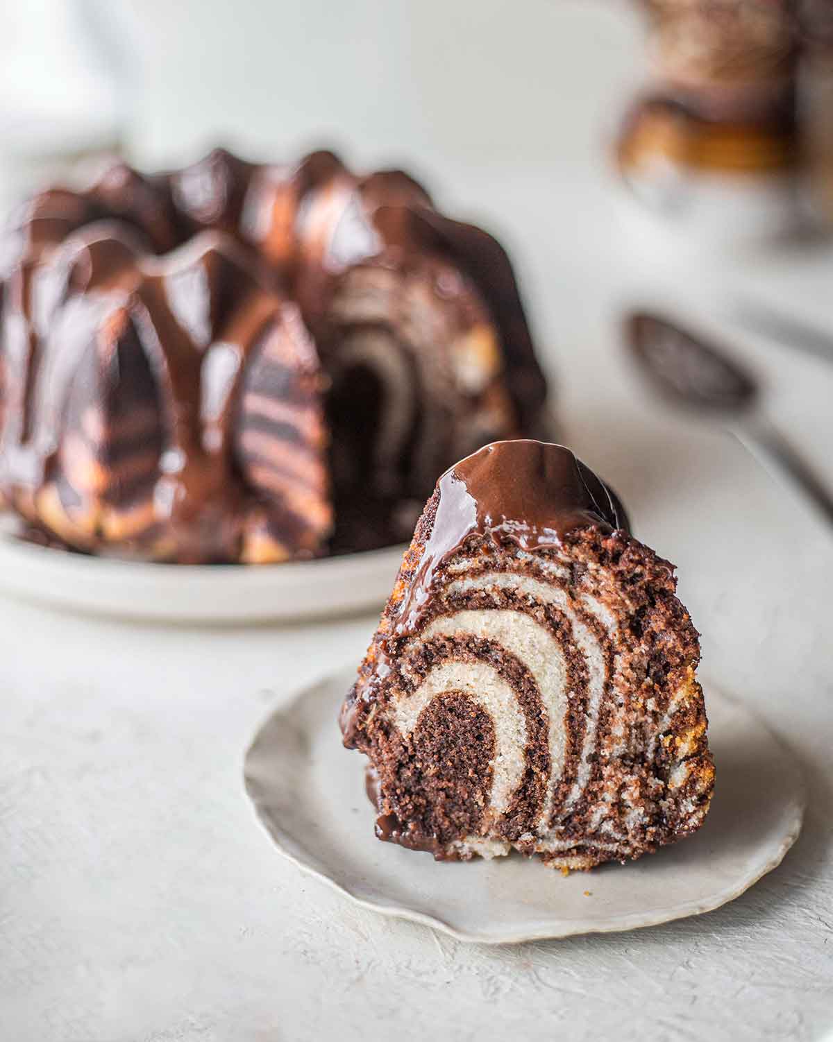 Close up of slice of the vegan zebra bundt cake.