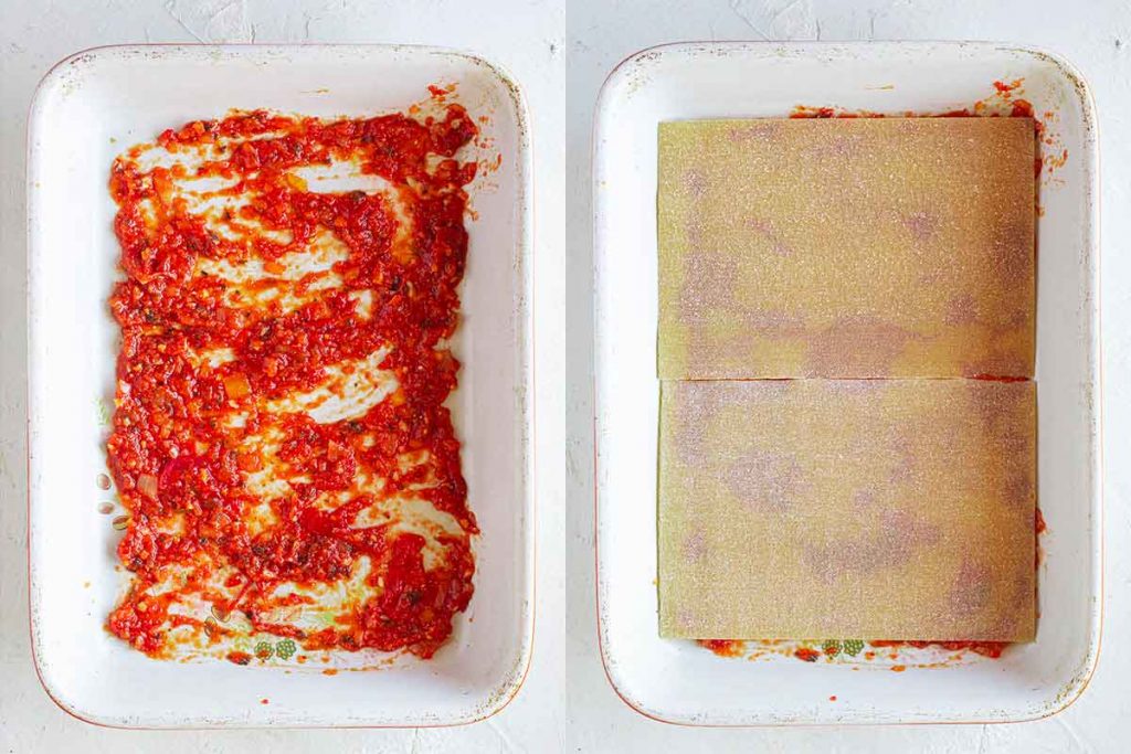 Casserole dish with tomato pasta sauce and lasagna sheets