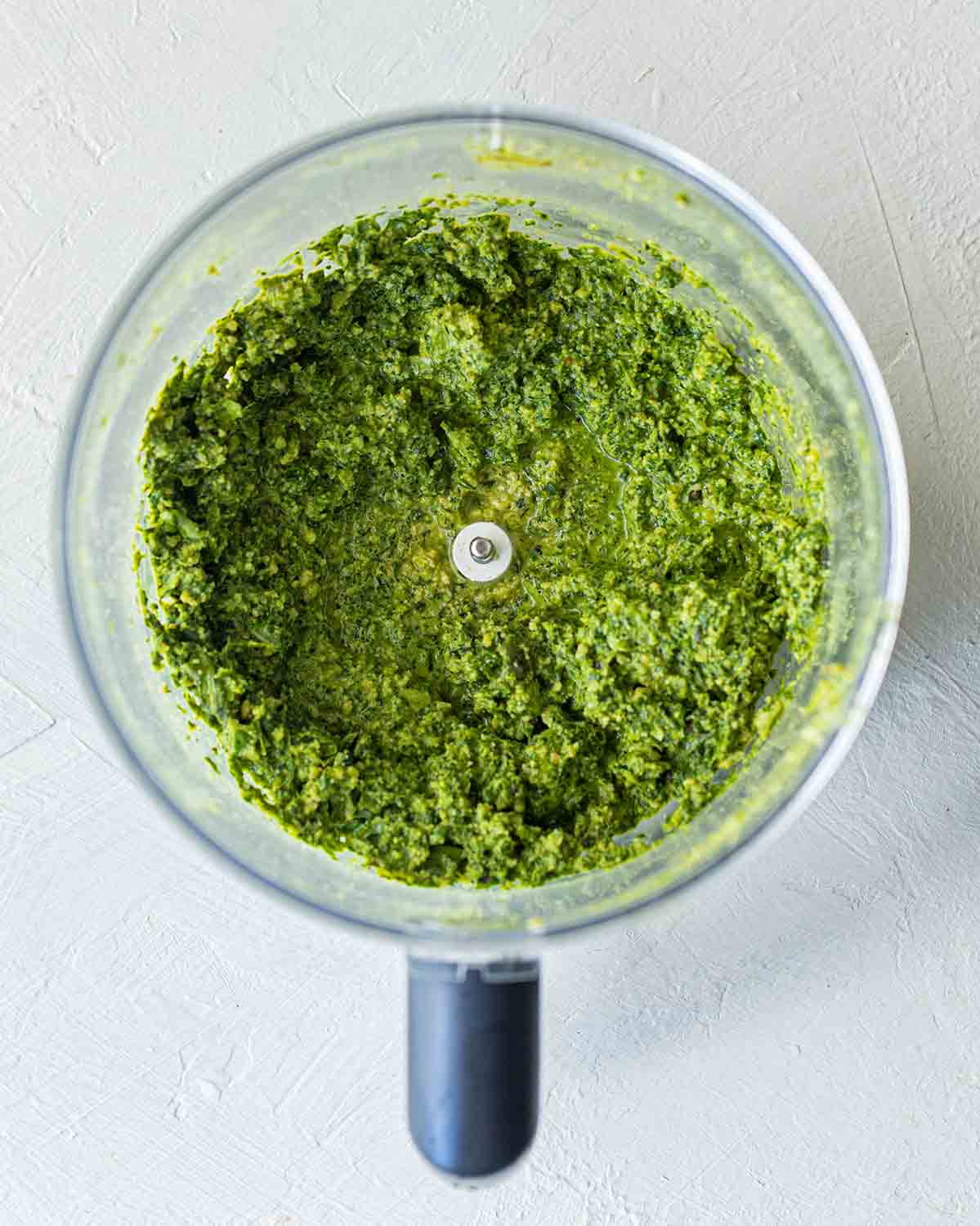 Pesto in food processor for salad.