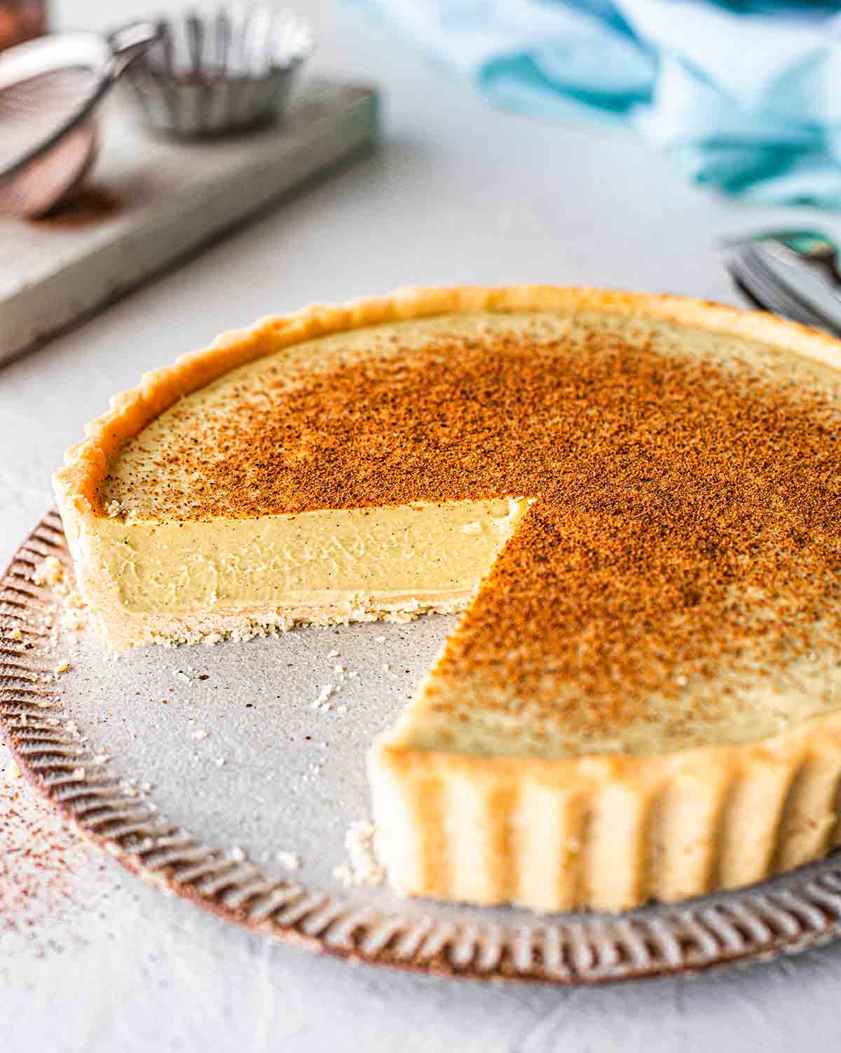 Vegan egg custard tart pie close up showing creamy texture