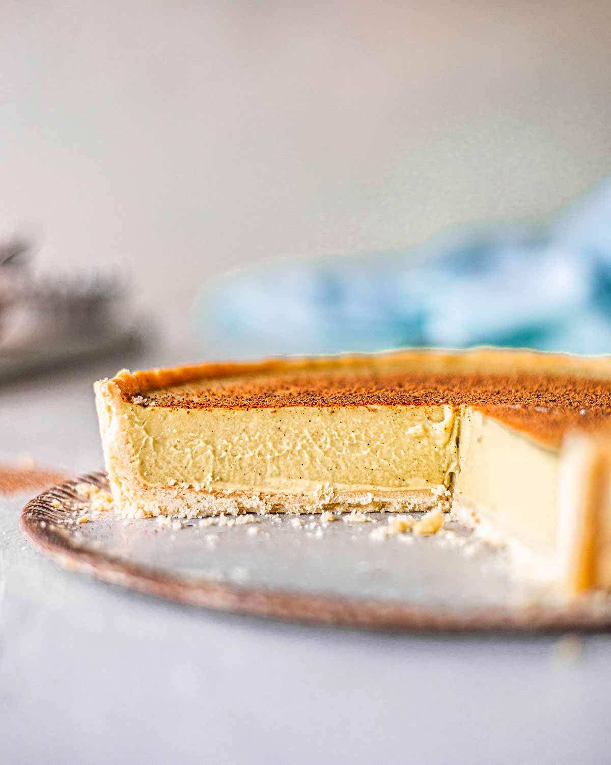 Close up of cut vegan custard pie showing creamy texture.