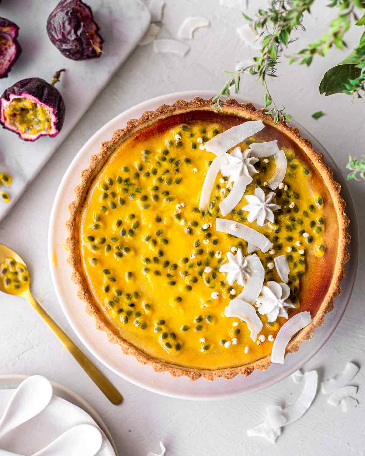 Overhead image of passionfruit tart.