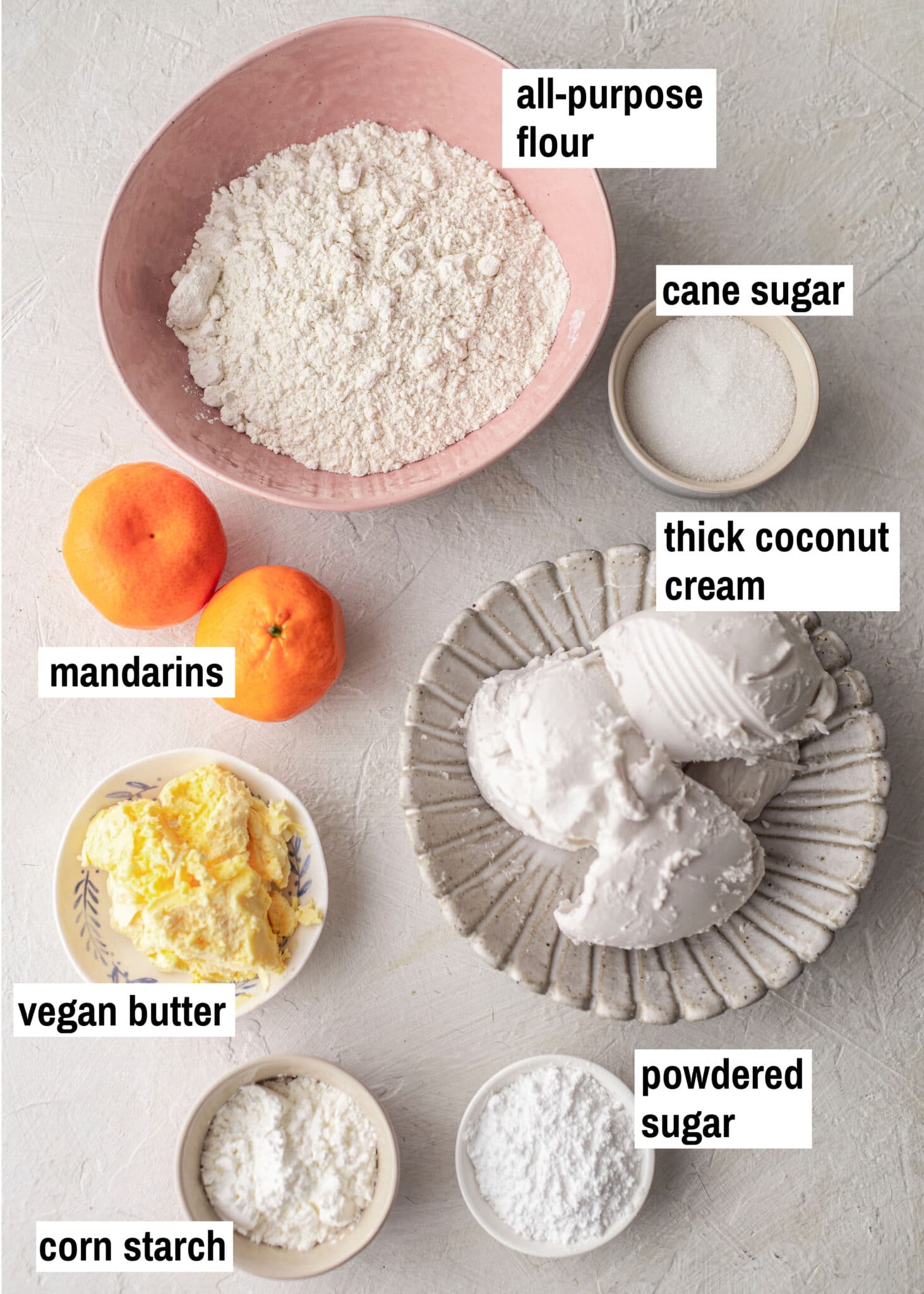 Flatlay of ingredients for mandarin tart.