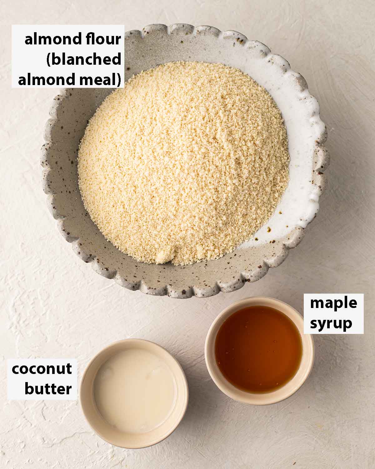 Flatlay of 3 ingredients for vegan almond flour cookies