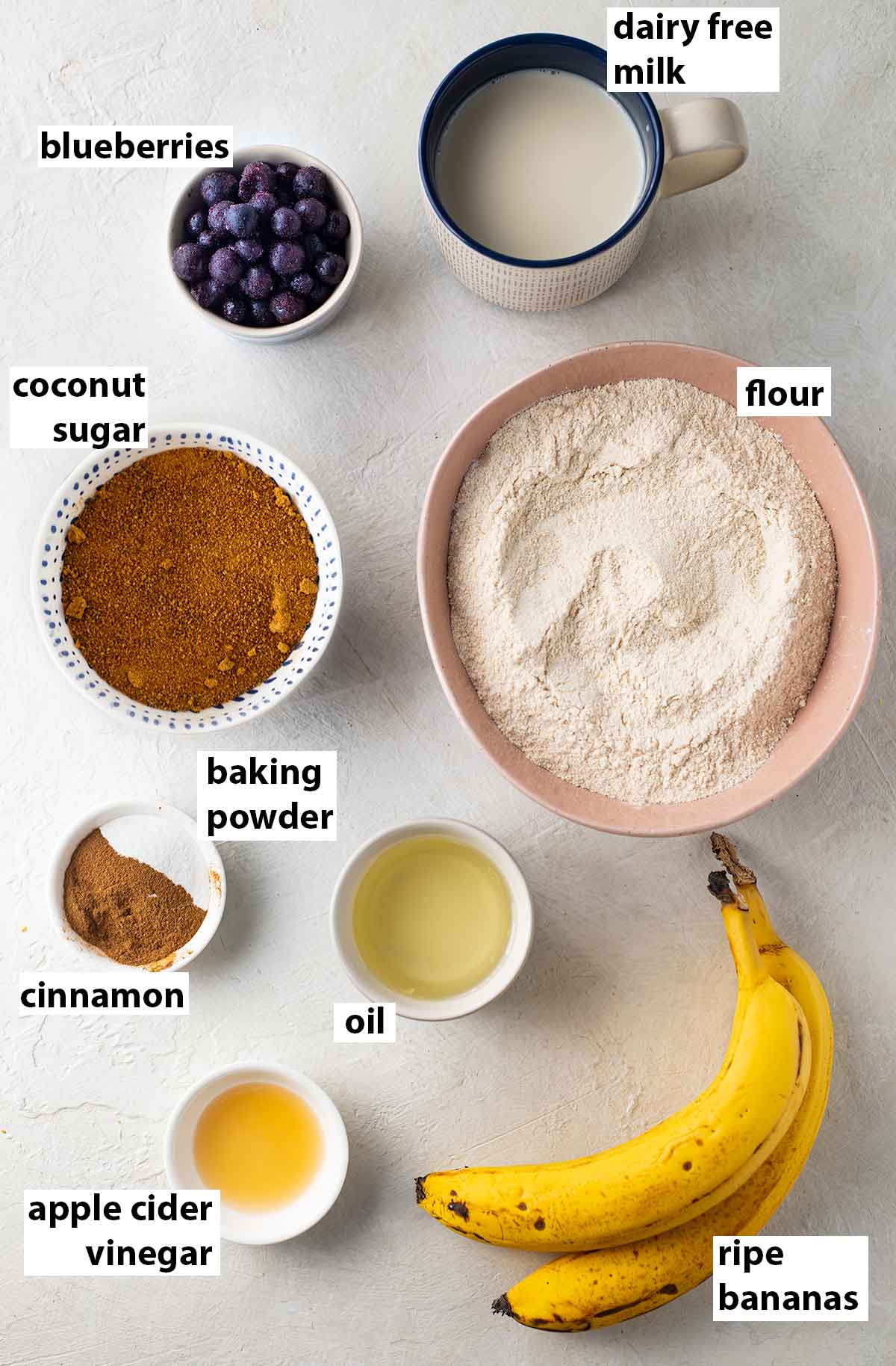 Flatlay of healthy, vegan and sugar free ingredients for vegan banana bread.