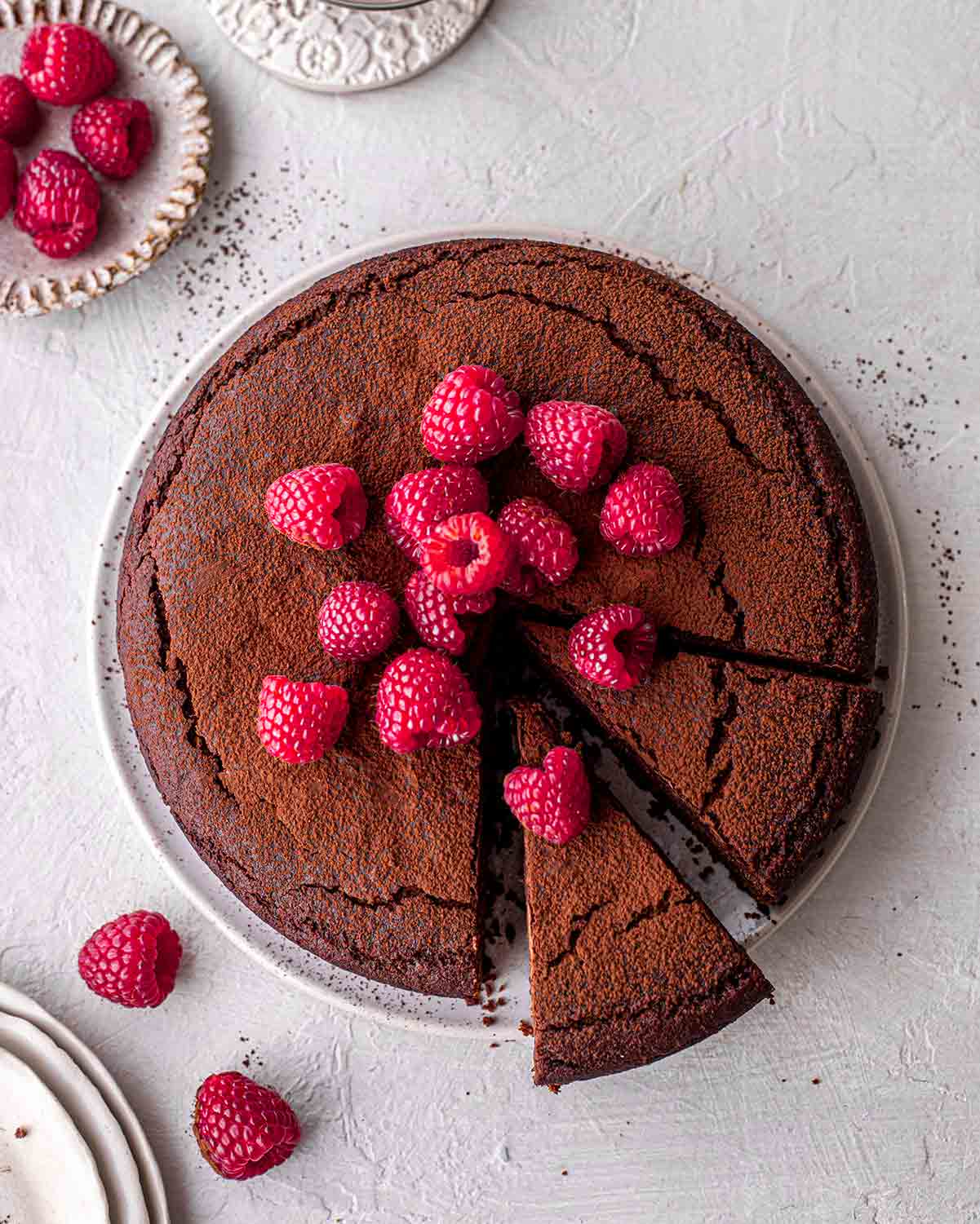 Overhead image of flourless chocolate cake showing crusty surface.