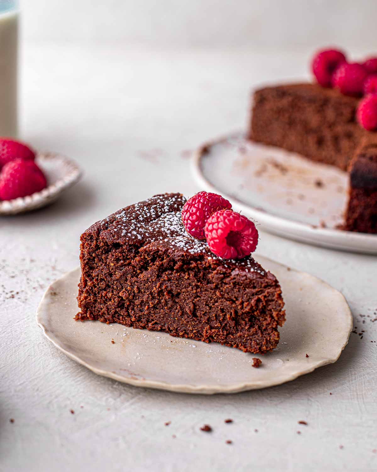 Close up of single slice of chocolate cake made with more applesauce.