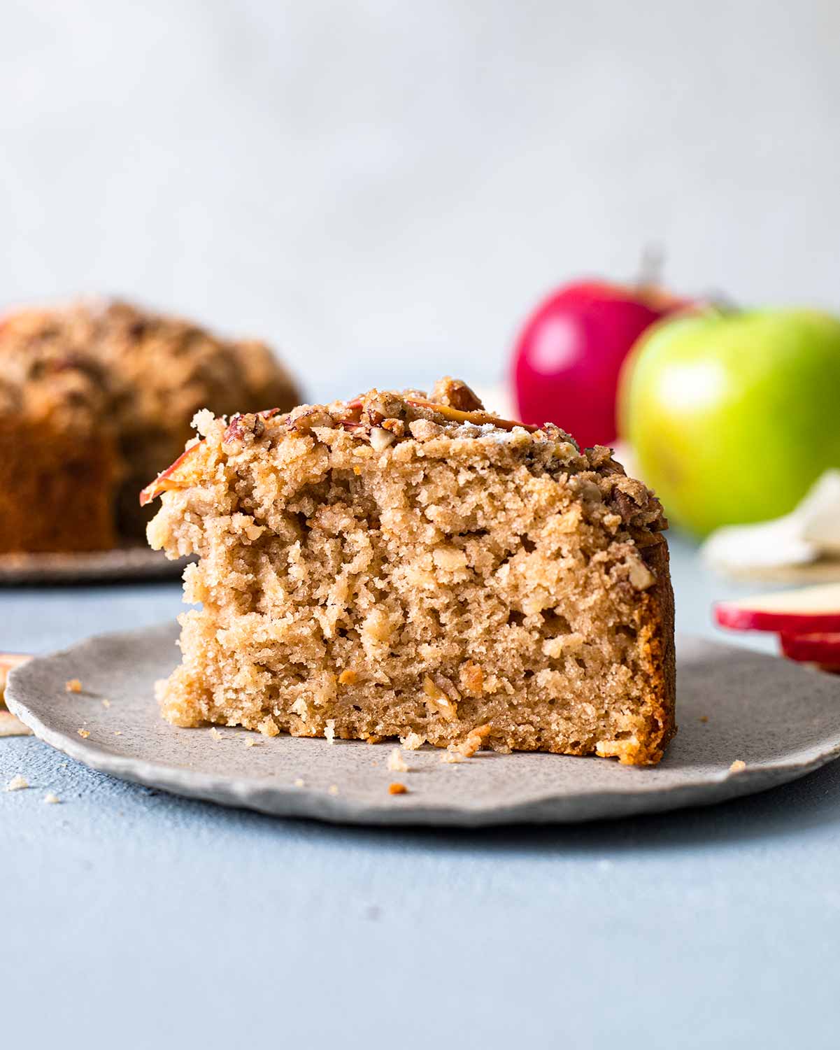 Close up of rustic, moist and fluffy texture of one slice of the cake.