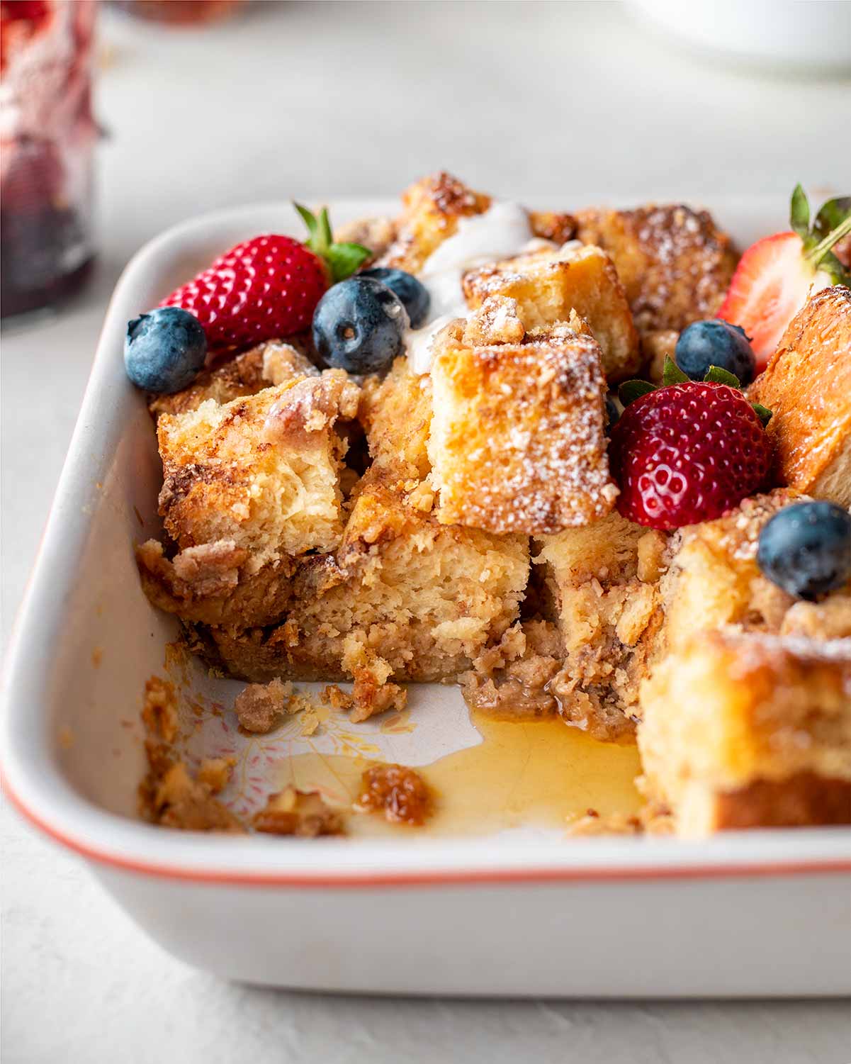 Close up of vegan french toast casserole cut into cubes.