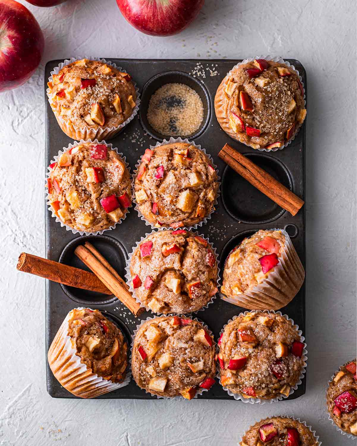 Flatlay of dozen muffins in tray.