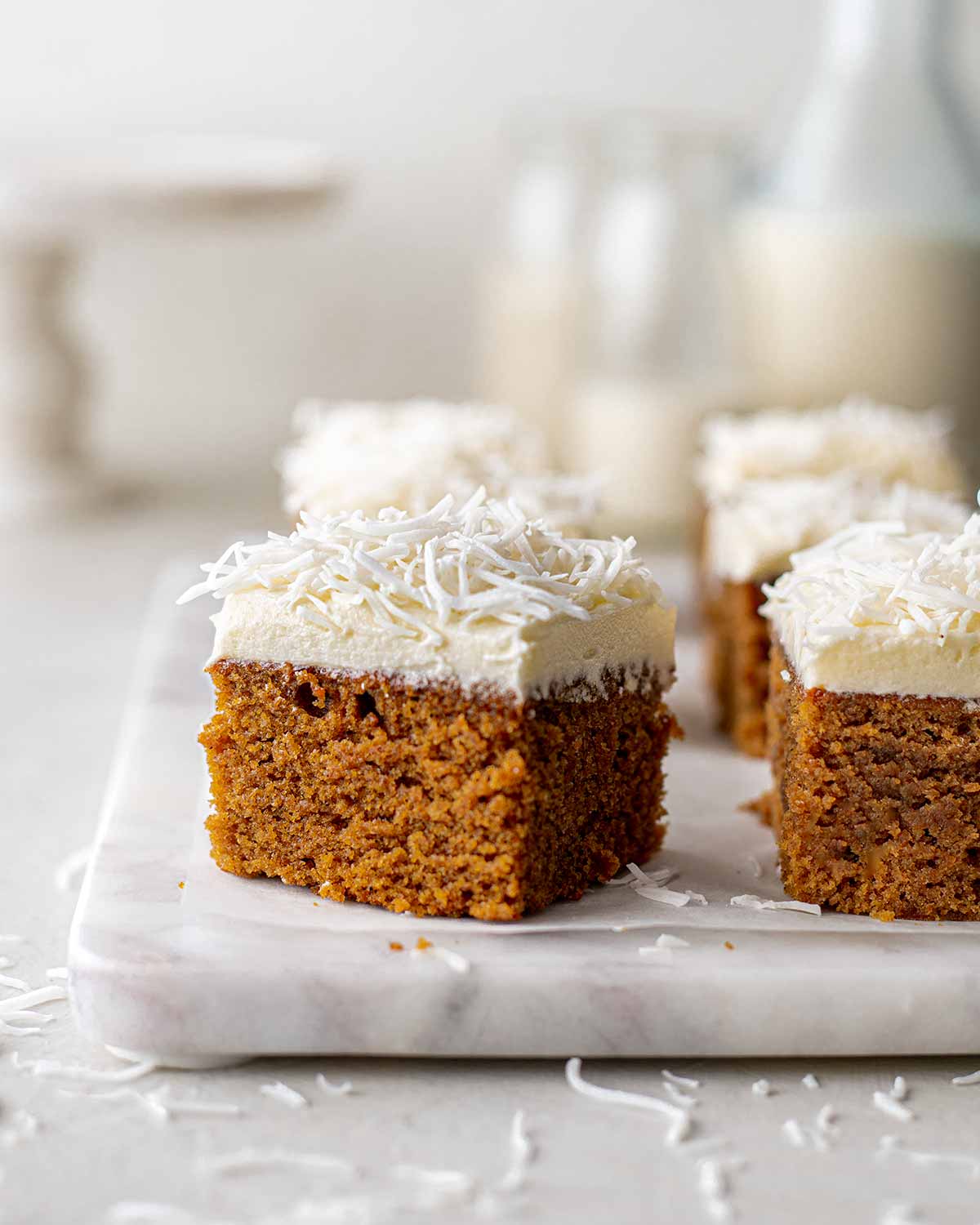 Close up of ginger cake on marble board.