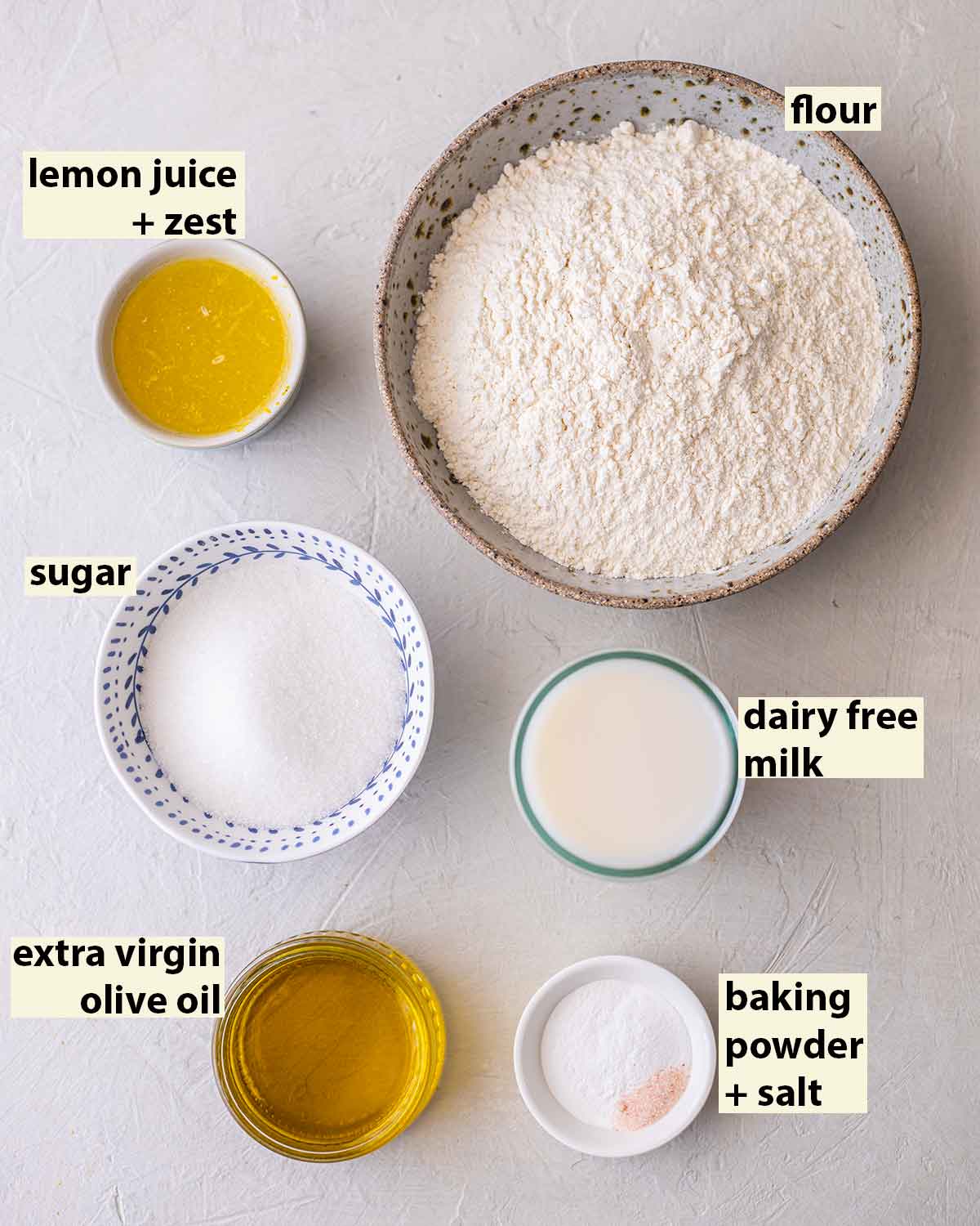 Flatlay of ingredients for vegan lemon olive oil cake.