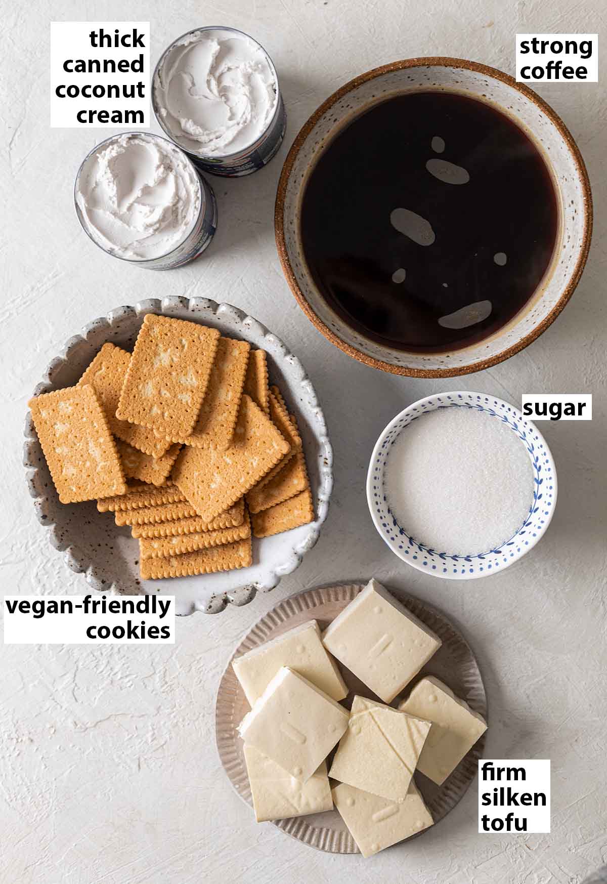 Flatlay of 5 key ingredients for tiramisu.