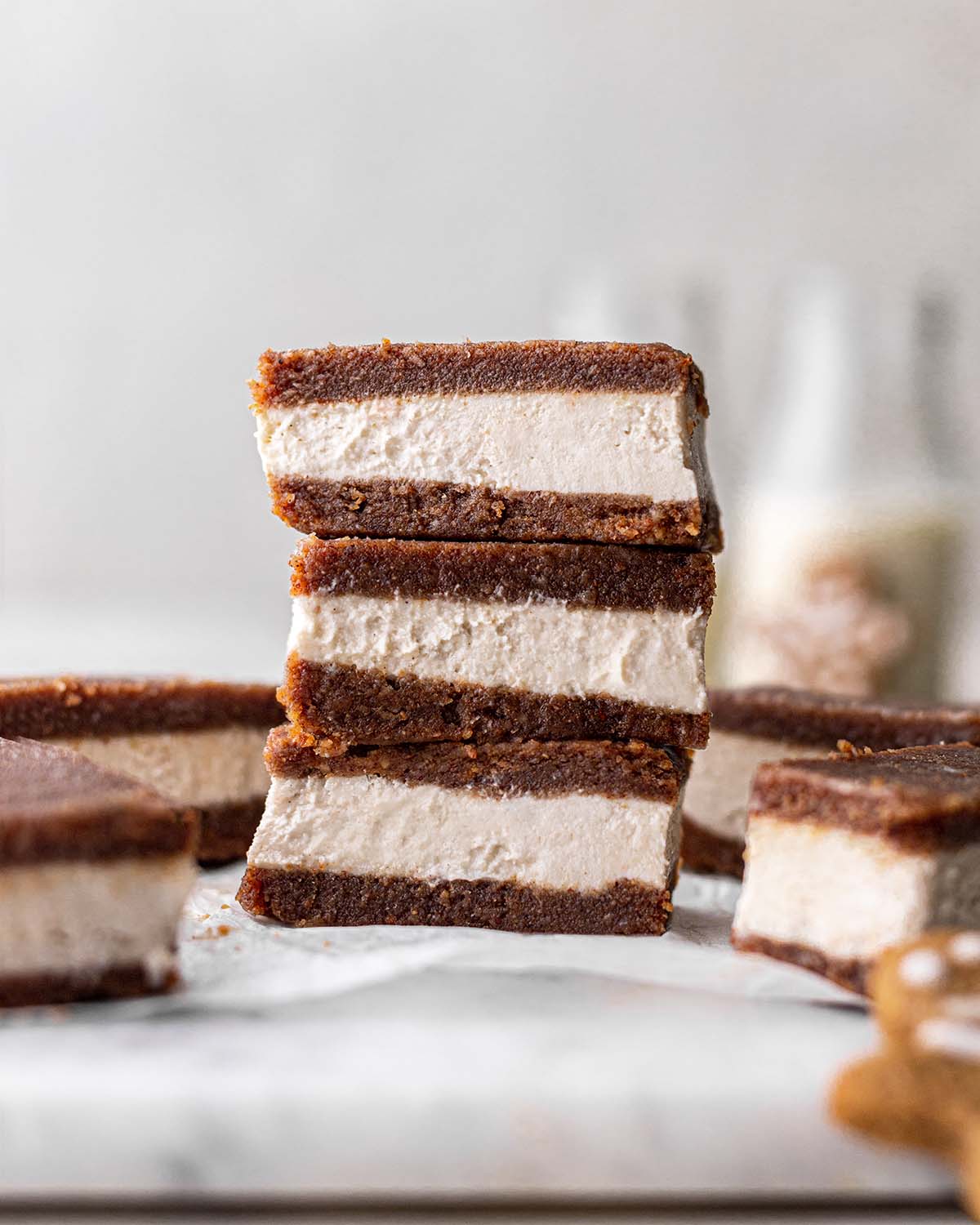 Vertical stack of gingerbread ice cream sandwiches.