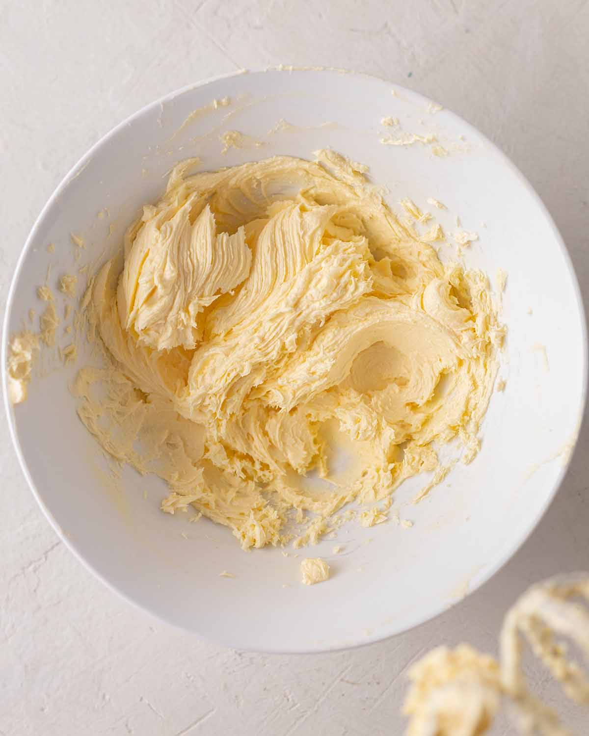 Light and fluffy whipped buttercream in bowl.