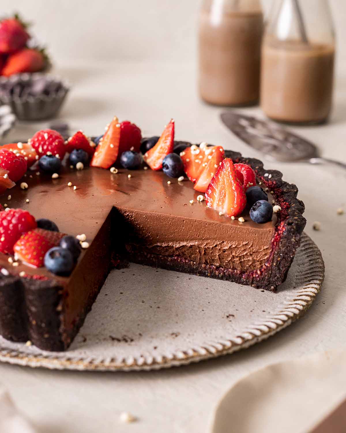 Close up of creamy mousse-like filling of vegan chocolate tart.