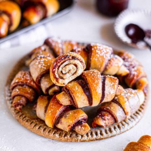 Stack of vegan chocolate rugelach on a plate.