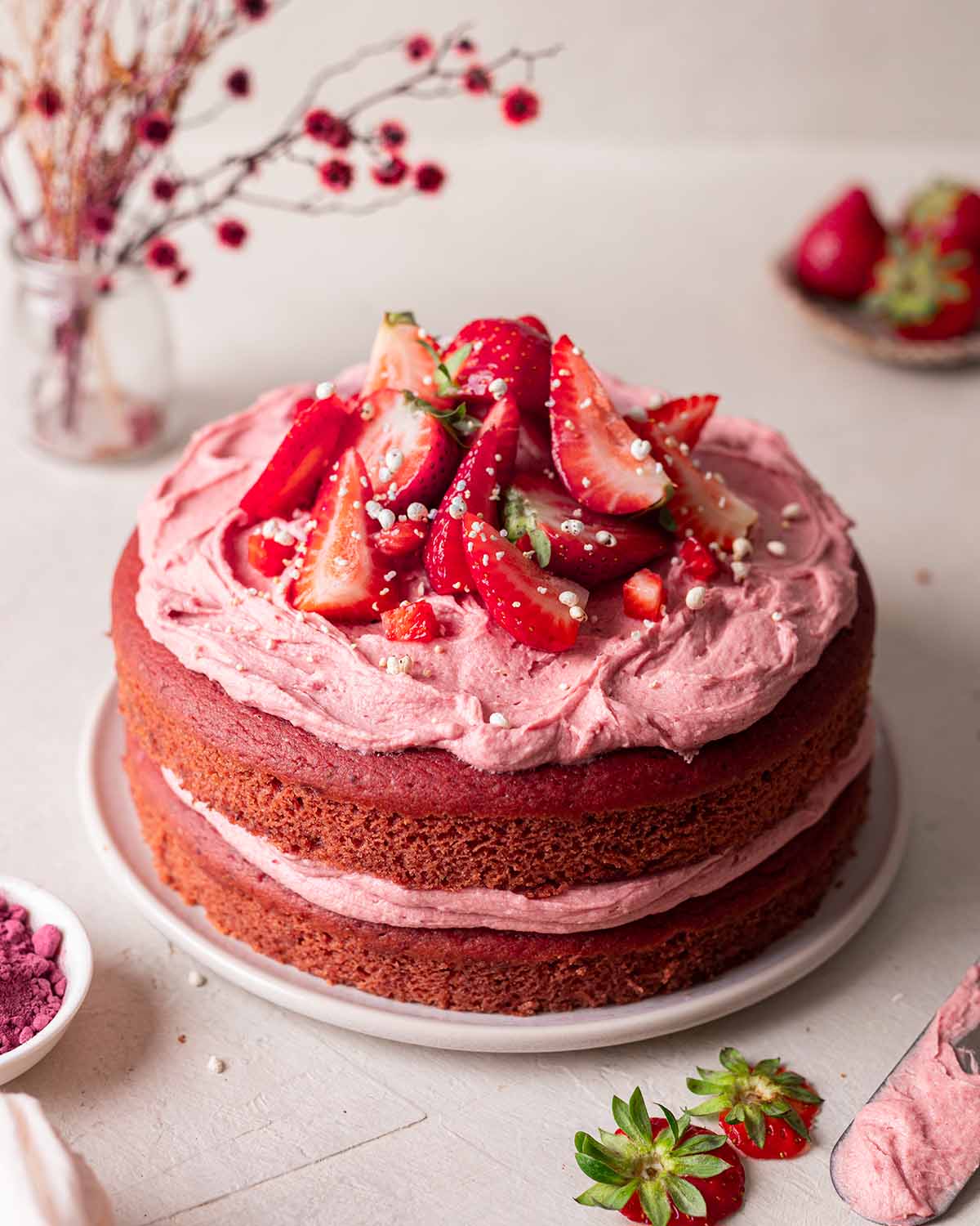 Vegan Strawberry Cake with strawberry buttercream on top. 