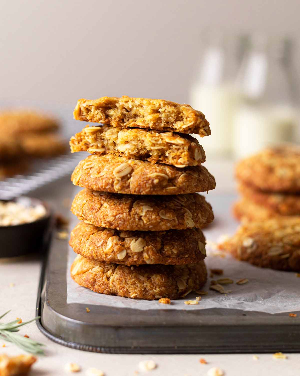 Stack of biscuits with one biscuit cut into half showing inside texture.