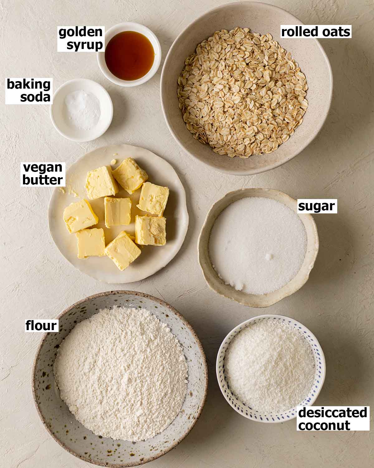 Flatlay of ingredients for Anzac biscuits.