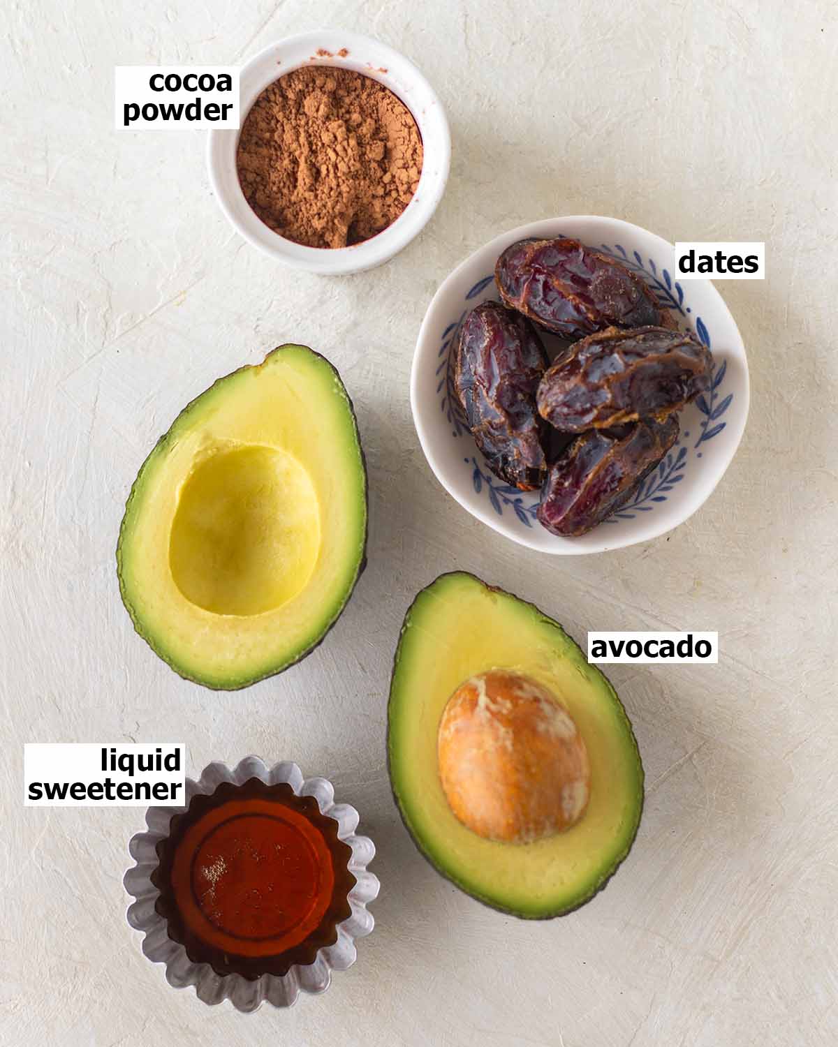 Flatlay of ingredients for avocado mousse frosting.