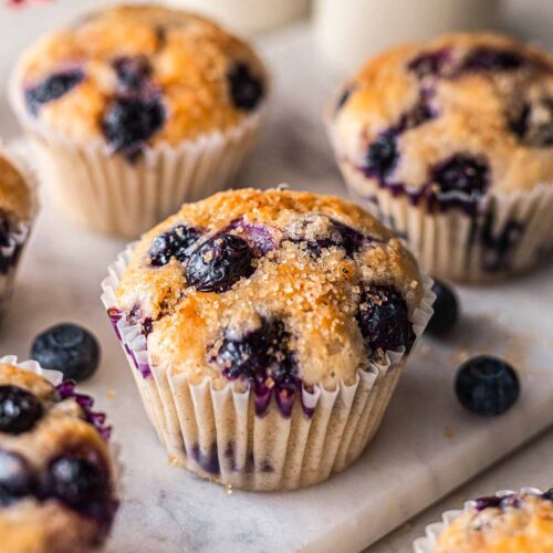 vegan blueberry muffins on a marble board