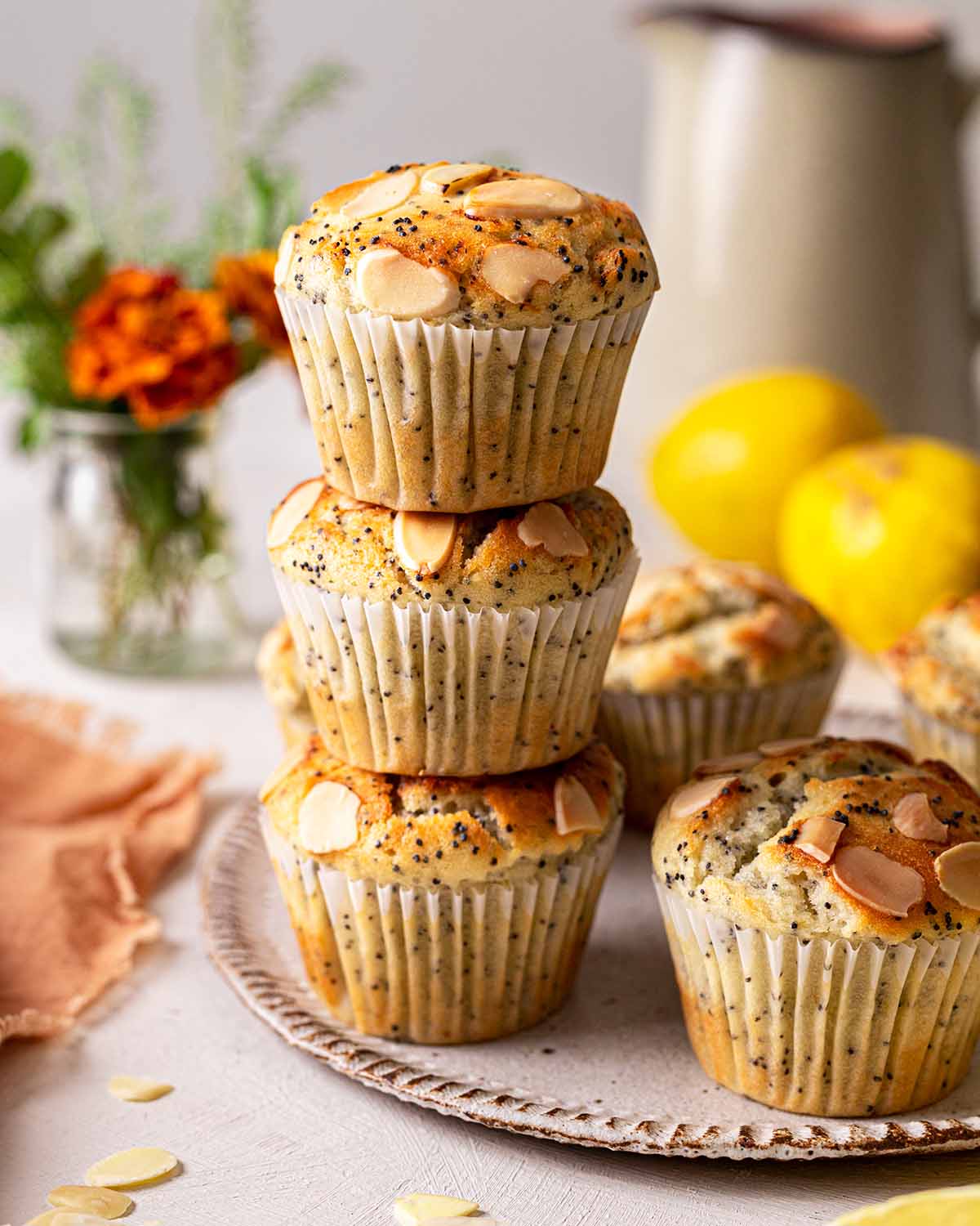 Stack of lemon poppy seed muffins.