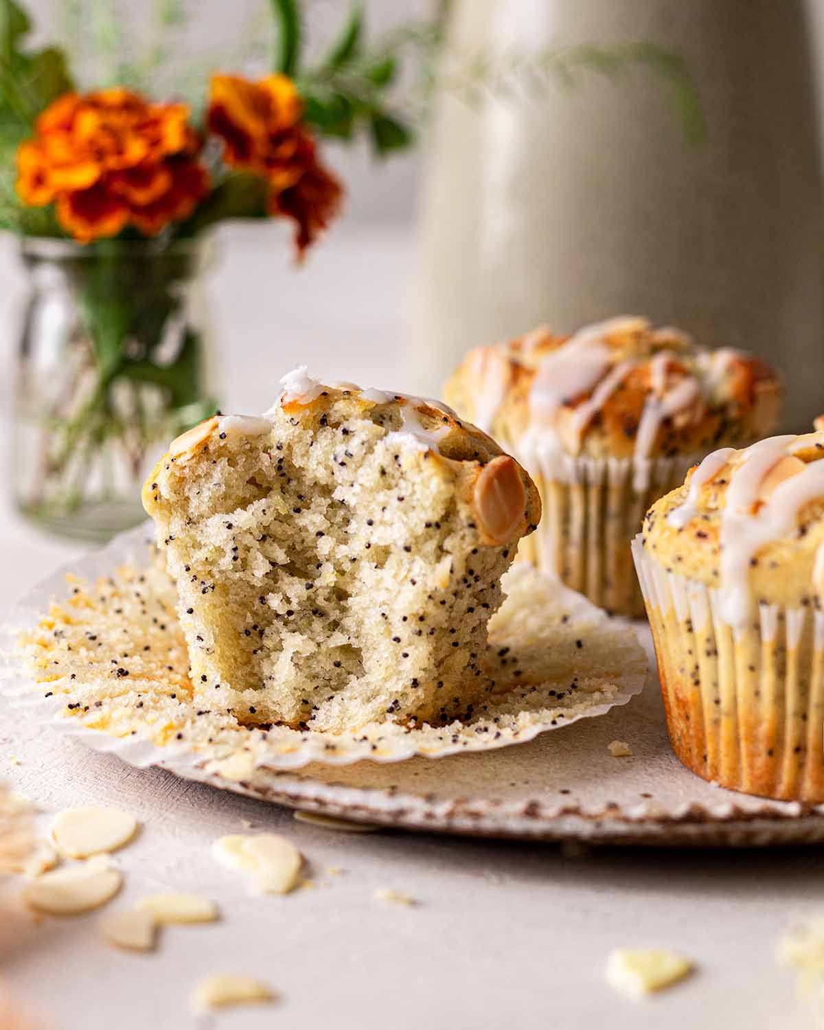 Bite shot of muffin showing fluffy and light texture.