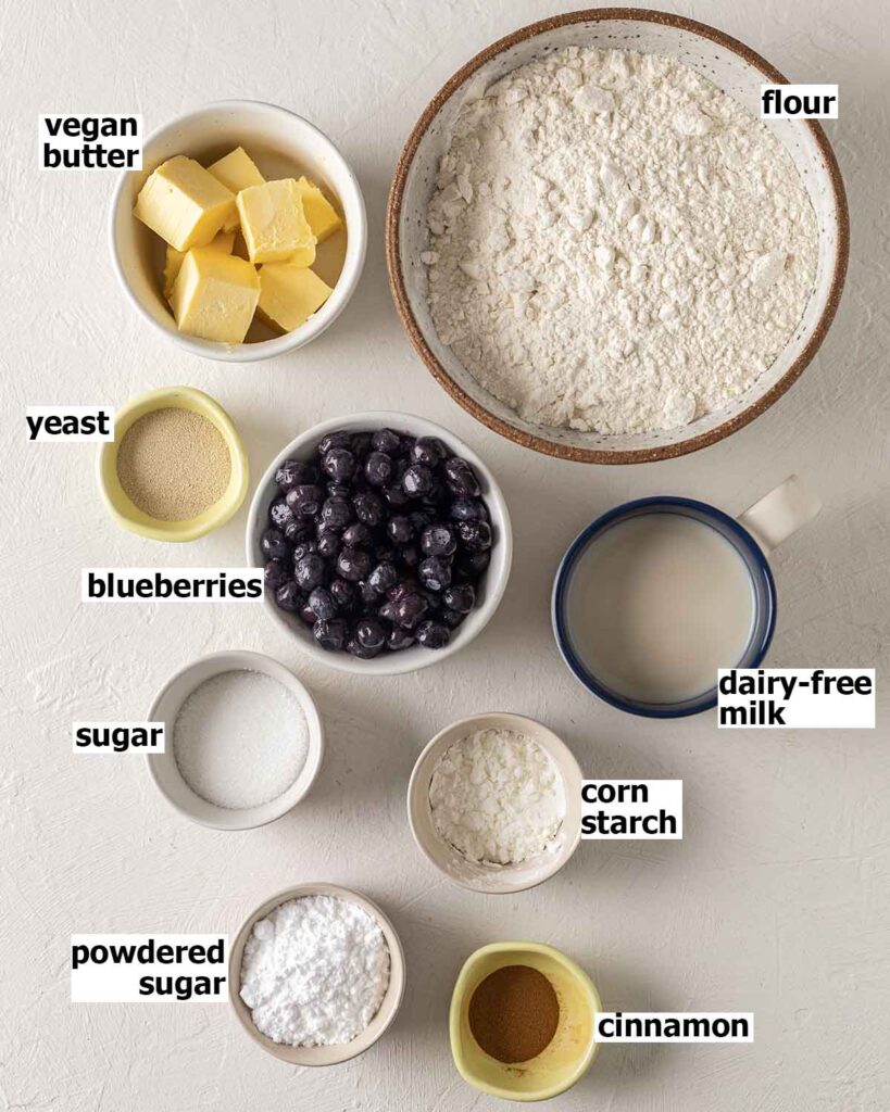 Flatlay of ingredients for vegan blueberry rolls.