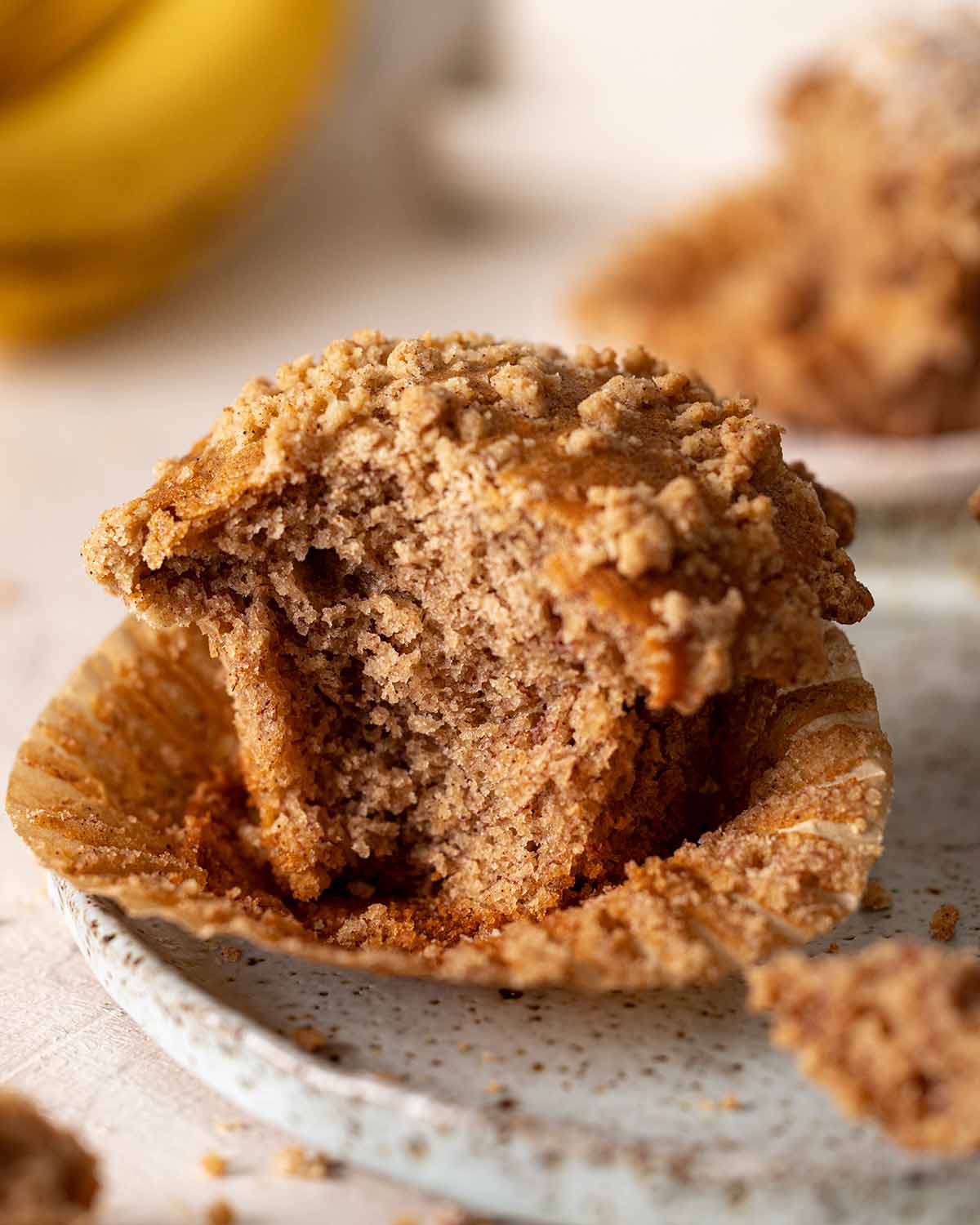 Close up of bite shot of banana muffin.