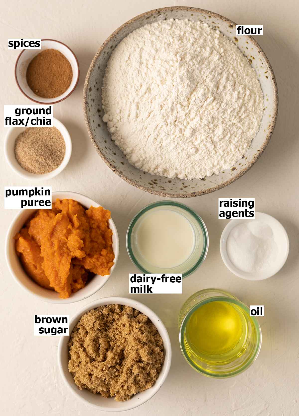 Flatlay of ingredients for vegan pumpkin bread.