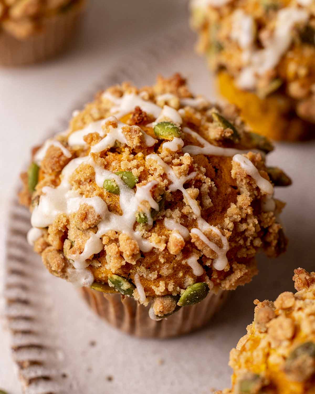 Close up of streusel topping on one muffin.