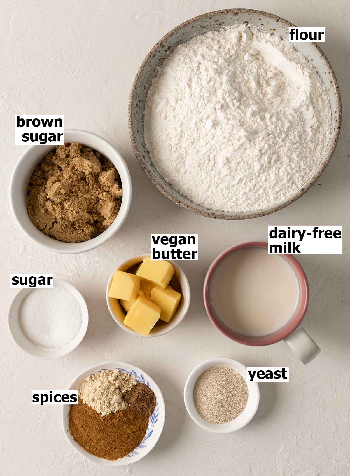 Flatlay of ingredients for the gingerbread cinnamon roll dough.