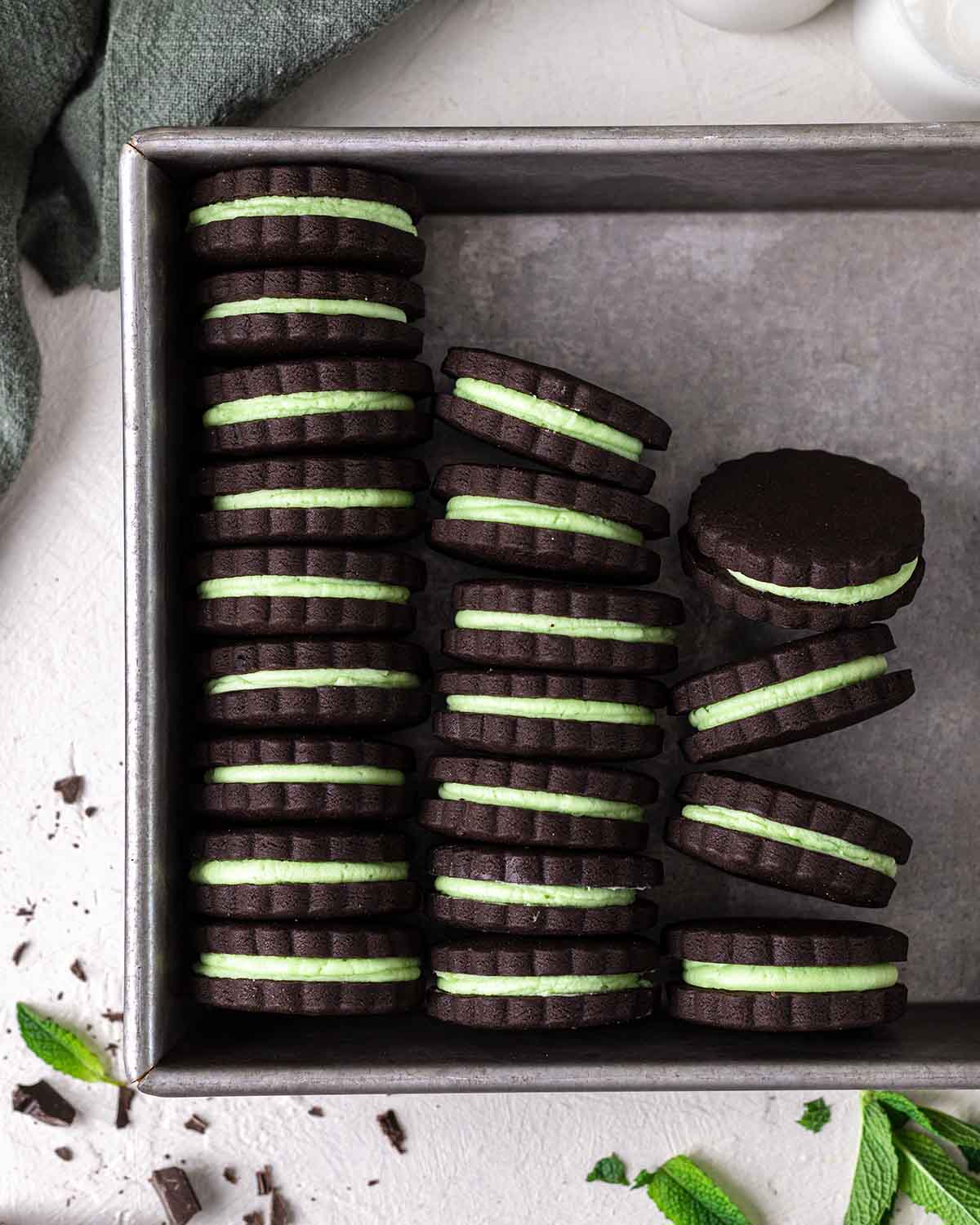 Cake pan filled with rows of chocolate mint cookies.