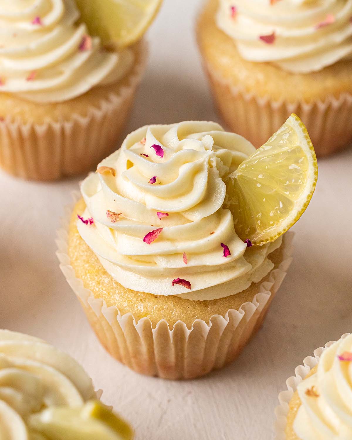 Close up of lemon frosting on cupcake.