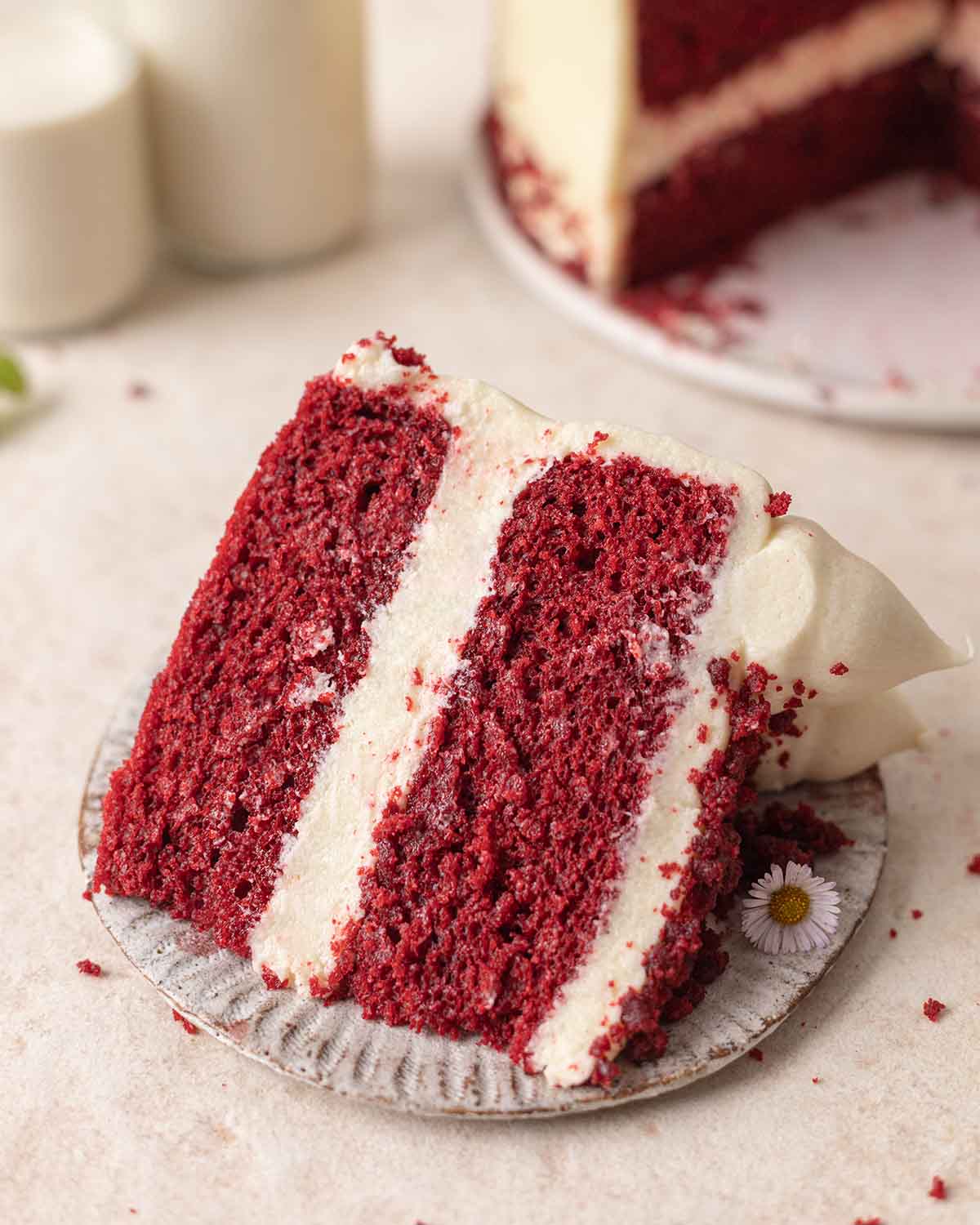 Close up of one slice of red velvet cake.