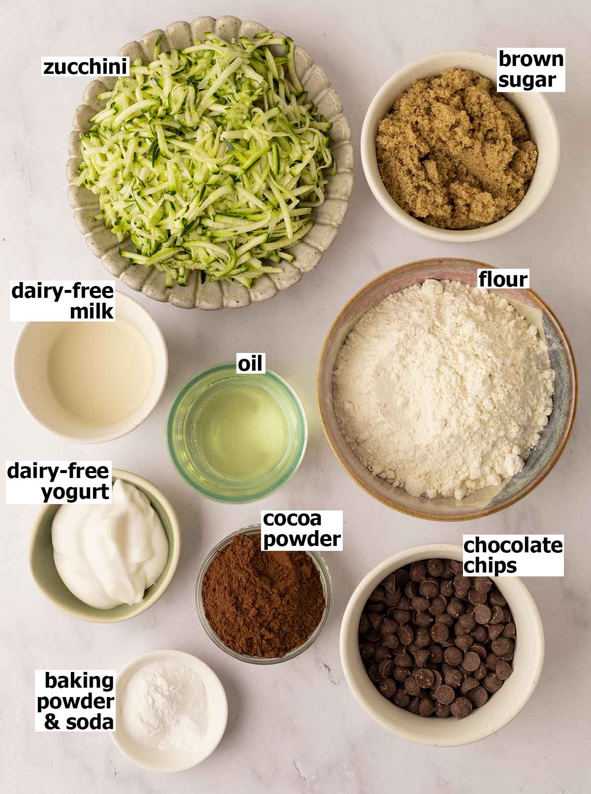 Flat-lay of ingredients for chocolate zucchini bread.