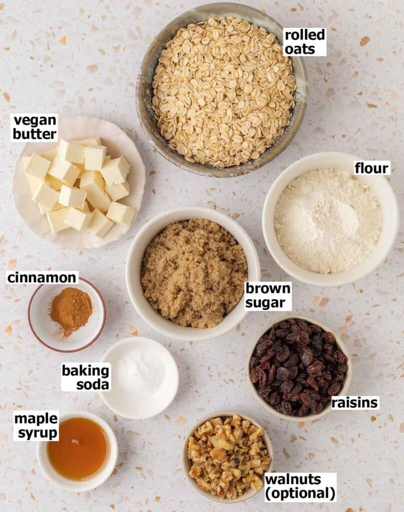 Flat-lay of ingredients for oatmeal raisin cookies.