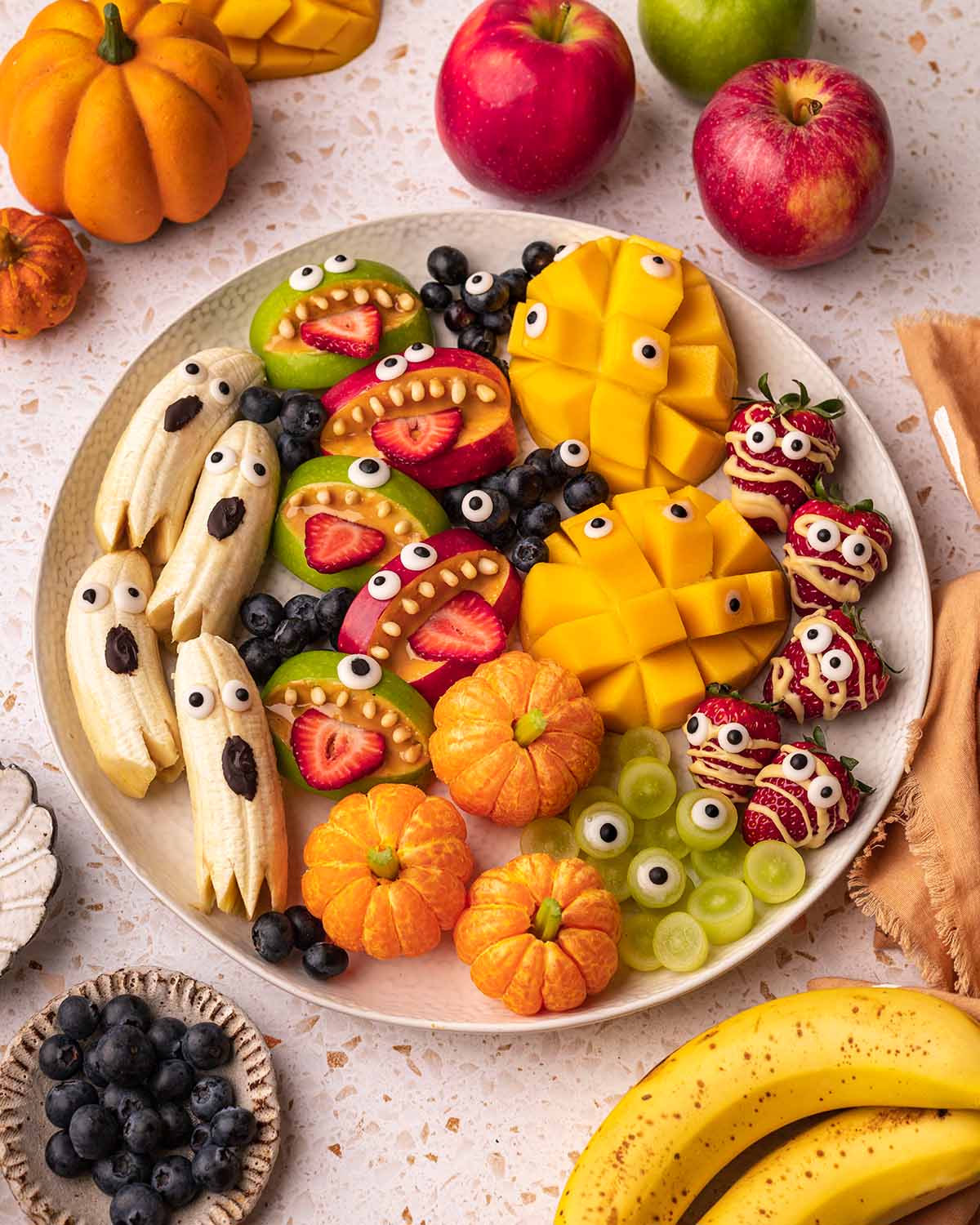 Overhead image of whole Halloween fruit platter.