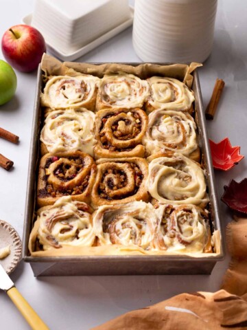 Vegan apple cinnamon rolls in sheet pan.