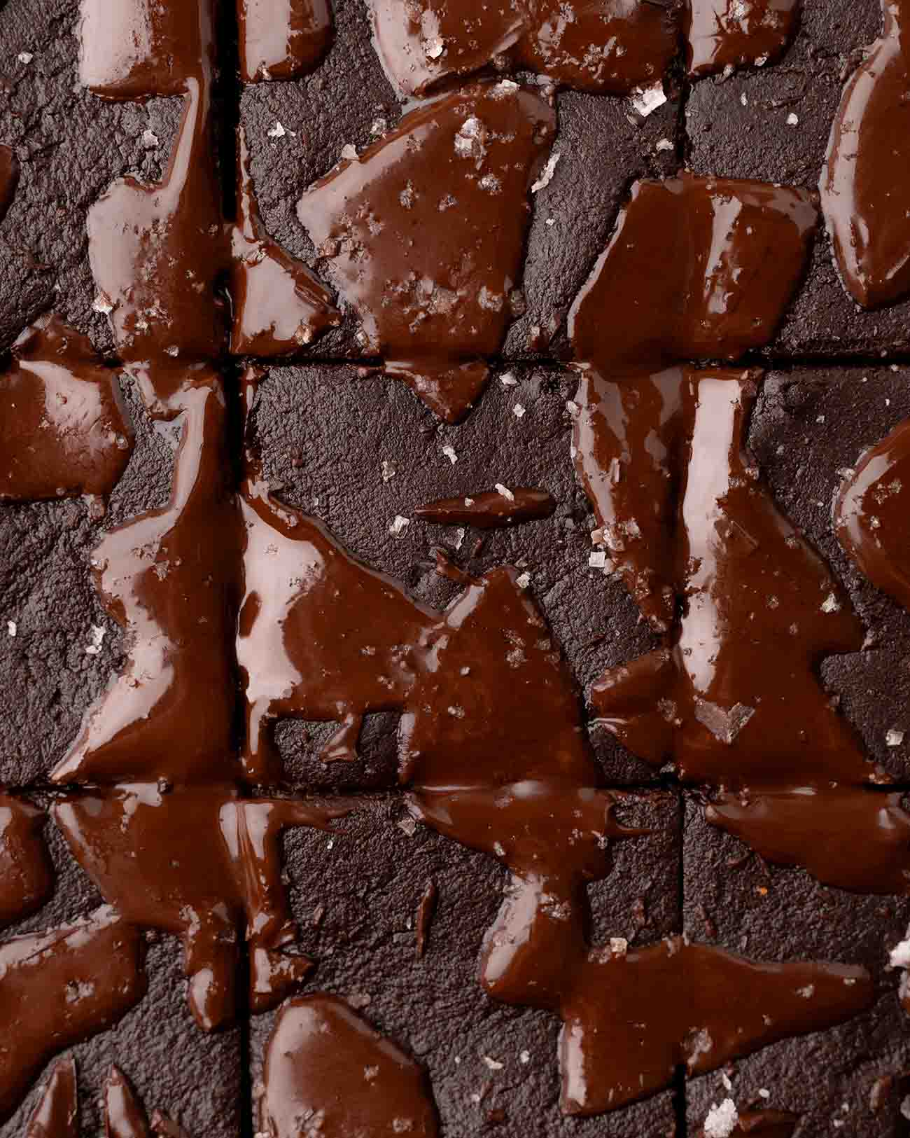 Overhead image of sweet potato brownies with gooey pools of chocolate.