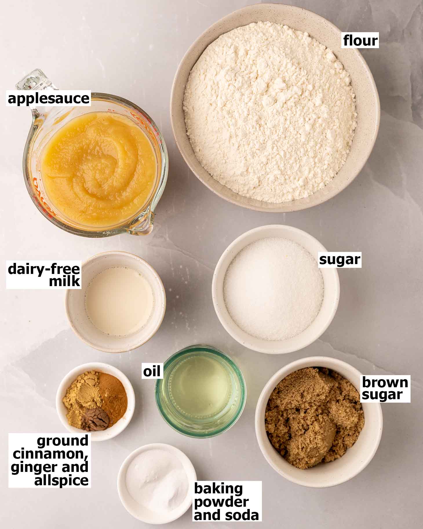 Flat-lay of ingredients for applesauce cake.