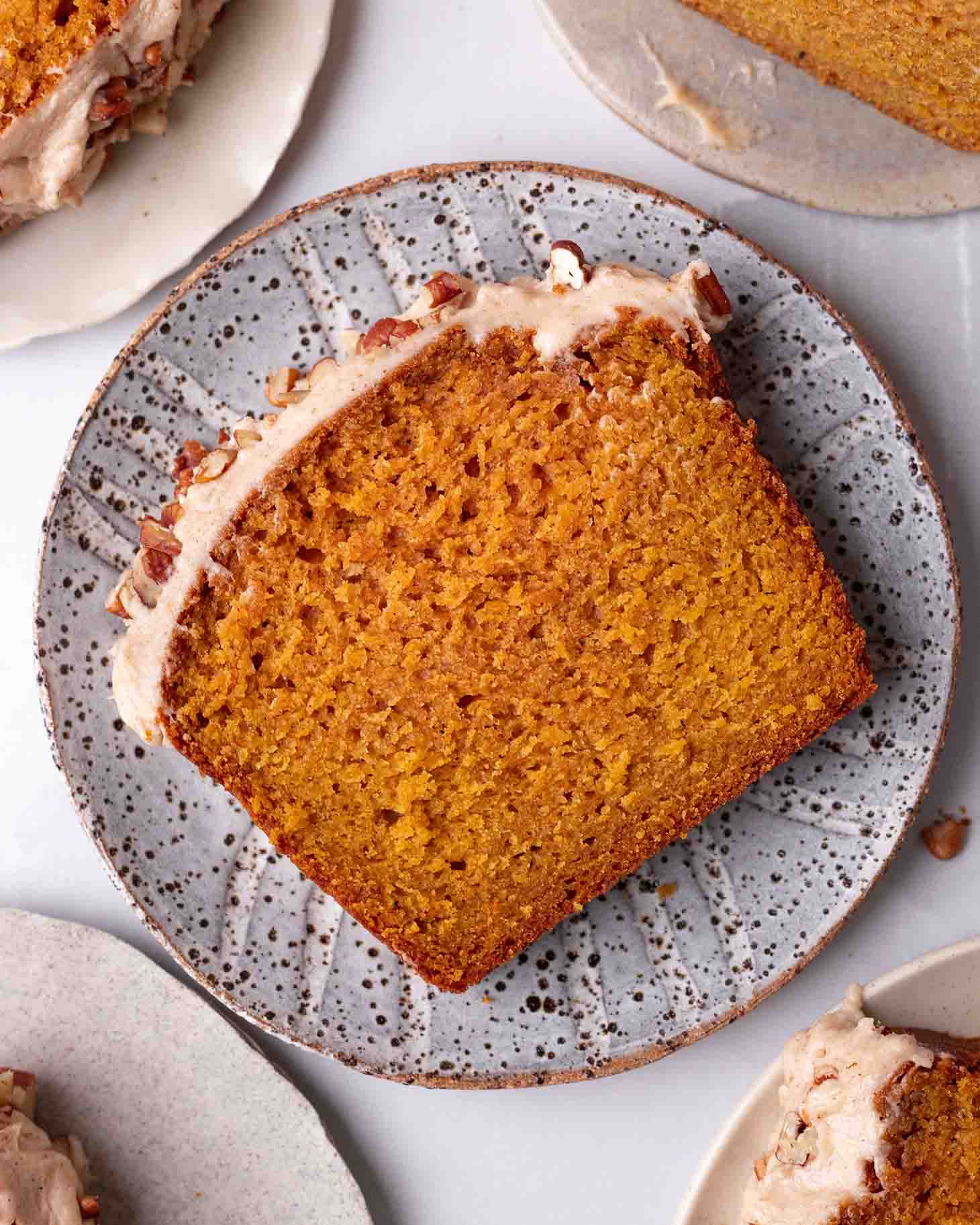 Close up of one slice of the sweet potato bread on a plate.