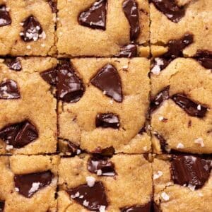 Close up of vegan chocolate chip cookie bars.