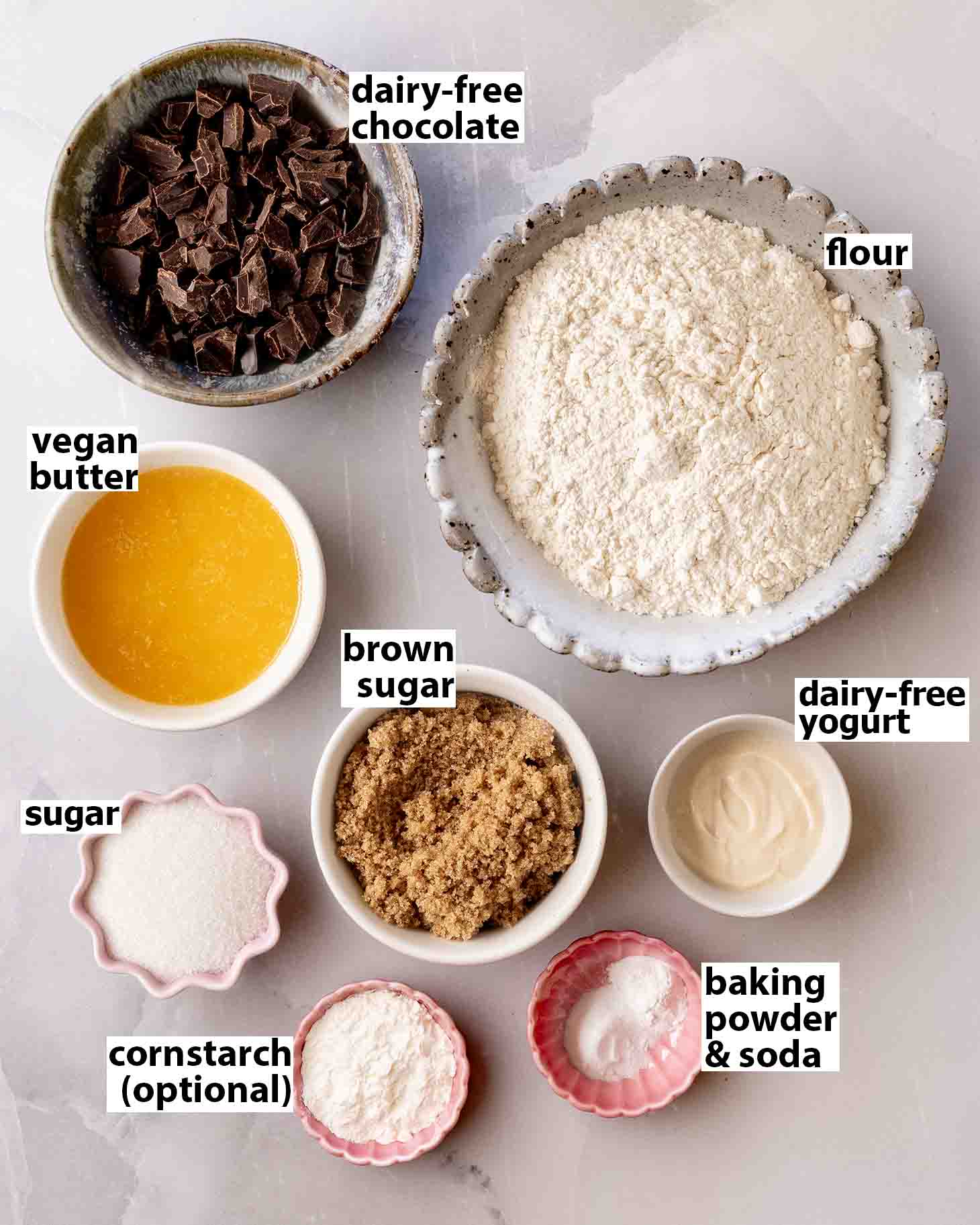 Flat-lay of ingredients for vegan chocolate chip cookie bars.